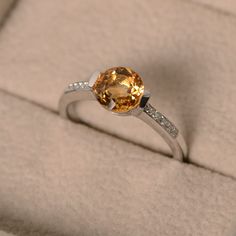 Classic Topaz Birthstone Jewelry, Classic Topaz Jewelry For Promise, Classic Topaz Birthstone Ring For Gift, Promise Ring With Citrine Birthstone, Orange Topaz Promise Rings, Orange Topaz Rings For Anniversary, Citrine Birthstone Ring With Gemstone For Promise, Citrine Gemstone Birthstone Ring For Promise, Anniversary Orange Topaz Rings