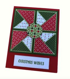 a red and green christmas card with the words christmas wishes written on it's side