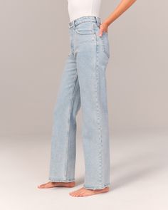 On-trend 90's-style high rise relaxed jeans, that are slim at the top with a wider leg shape, featuring a full-length leg, light indigo wash and frayed hem. 90s Relaxed Jeans, High Rise 90s Relaxed Jean, Women's Bottoms, Relaxed Jeans, 90s Fashion, Abercrombie Fitch, Levi Jeans, Womens Bottoms, Mom Jeans