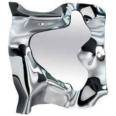 an abstract silver object with black and white designs