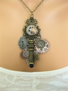 Steampunk Statement Necklace, Assemblage Steampunk Necklace, Steampunk Gear Necklace, Large Steampunk Key Necklace,Victorian Steampunk,N-866 by RalstonOriginals on Etsy Steampunk Metal Jewelry Vintage Collection, Steampunk Metal Jewelry With Vintage Charm, Steampunk Jewelry With Vintage Charm, Steampunk Silver Brass Necklaces, Steampunk Jewelry With Antique Metal Finish, Steampunk Metal Jewelry With Antique Finish, Steampunk Silver-color Brass Necklaces, Steampunk Gold Necklace For Vintage Collection, Silver Steampunk Brass Necklaces