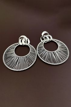 Elevate your style with our Metal Hollow Large Circle Earrings. These striking earrings feature intricate metalwork in a bold circular design, adding a touch of elegance to your look. Crafted with high-quality materials, they not only enhance your allure but also exude sophistication. Perfect for formal occasions, cocktail parties, or when you want to make a statement with your outfit, these earrings are the ideal choice to complement your ensemble with a touch of contemporary charm. Elegant Silver Hoop Clip-on Earrings, Trendy Metal Round Earrings, Trendy Round Metal Earrings, Elegant Circular Metal Earrings, Elegant Circle Metal Earrings, Metal Hoop Earrings For Parties, Silver Round Metal Clip-on Earrings, Elegant Metal Clip-on Hoop Earrings, Elegant Clip-on Metal Hoop Earrings