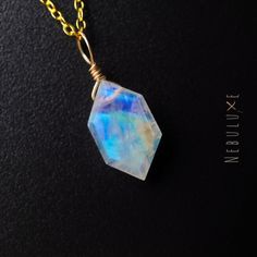 🌈 Our Rainbow Moonstone necklace, with its stunning iridescent hues is a perfect accessory to add a touch of magic to your outfit, and is the perfect gift for June birthdays. Allow Rainbow Moonstone to guide you towards a fresh start, filling your life with hope and endless possibilities 💎 ⭒ Chain Material: 925 Sterling Silver ⭒ Chain Length: 16-18" / 18-20" Inches ⭒ Finish: Silver * Gold * Rose Gold ⭒ Gemstone Size: 10x15mm  ⭒ Each necklace comes with a crystal information card & stylish bran Mystical Iridescent Moonstone Necklace, Iridescent Moonstone For Jewelry Making, Mystical Iridescent Gemstone Necklace, Mystical Iridescent Moonstone Jewelry, Iridescent Moonstone Gemstone Necklaces, Iridescent Moonstone Gemstone Necklace, Iridescent Moonstone Pendant Jewelry, Iridescent Gemstone Pendant Crystal Necklace, Minimalist Moonstone Crystal Necklace With Gemstone