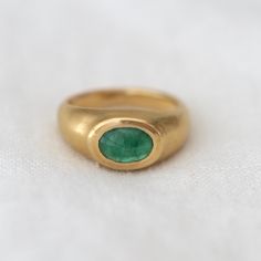 Emerald cabochon set in 20K solid yellow gold signet ring on white background Emerald Cabochon Ring, Emerald Cabochon, Work Gifts, Zambian Emerald, Cabochon Ring, Fine Rings, Engagement Ring Wedding Band, Solid Yellow, Wedding Ring Bands