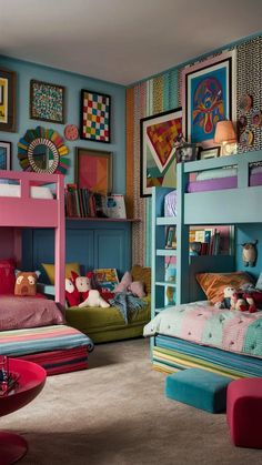 a bedroom with bunk beds and colorful decor on the walls, including pictures above them