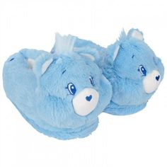 a pair of blue slippers with an animal face on the front and back side