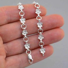 Forget Me Not Bracelet, 925 Silver Forget Me Not Motif BraceletThe bracelet is 7.75" long (19.5cm)Each Floral link is 13mm by 8.5mmThe  catch is 11mm longMatching Earrings - https://www.etsy.com/listing/226396032/forget-me-not-stud-earrings-inspired-by?ref=shop_home_active_26&frs=1We have more bracelets in our shop, all unique to LaGrangeBijoux, some quirky, some romantic, many reflecting nature's beauty, please do explore our shop further https://www.etsy.com/shop/LaGrangeBijoux?section_id=1639 Not Bracelet, Meaningful Gifts For Her, Flower Jewelry, Nature Bracelets, Forget Me Not, Silver Flowers, Flower Jewellery, Chain Link Bracelet, Infinity Bracelet