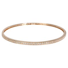 Diamond Bangle in 18k Rose Gold 1.75 CTW PRIMARY DETAILS SKU: 117284 Listing Title: Diamond Bangle in 18k Rose Gold 1.75 CTW Condition Description: Retails for 2995 USD. In excellent condition and recently polished. Chain is 8 inches in length. Metal Type: Rose Gold Metal Purity: 18k Chain or Bracelet Length (in): 8 Pre-Owned Jewelry Condition: Excellent SIDE STONE INFORMATION Side Stone 1 Gem Type: Diamond Side Stone Weight 1 (cts): 1.75 Side Stone 1 Shape: Round Brilliant Side Stone 1 Color: G Hand-set Rose Gold Diamond Bracelet, Hand Set Rose Gold Diamond Bracelet, Rose Gold Diamond Bangle With Vvs Clarity, Rose Gold Vvs Clarity Bracelet, Diamond Bangle In Rose Gold With Pave Setting, Hand Set Diamond Rose Gold Bracelet, Rose Gold Diamond Bangle With Pave Setting, Rose Gold Diamond Bracelet With Pave Setting For Wedding, Rose Gold Tennis Bracelet With Pave Setting As Gift