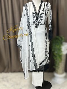 Kurti pant with dupatta  Material: soft organza Sheer Organza Dupatta For Festive Occasions, Sheer Georgette Sets For Formal Occasions, Festive White Unstitched Suit With Lace Work, Traditional Sheer Georgette Dupatta, Elegant Lawn Suit With Lace Work, White Fitted Sharara With Lace Work, Party White Semi-stitched Dupatta, Fitted Sheer Elegant Dupatta, Sheer Fitted Elegant Dupatta