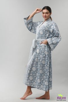 "Immerse yourself in a breathable 100% cotton fabric Kimono - a symbol of longevity and good fortune. Kimono , a loose fitting garment slips over your shoulders and tied at the waist with a flexible belt making a new dressing style. It has two pockets in front to help you keep your mobile and keys. It can be perfect for all weather, stylish, versatile outfit from casual to refined. A lightweight flowy outfit comes in a wide variety of options - cropped, mid-length to full length. Depending on yo Blue Cotton Sleepwear For Home, Cotton Relaxed Fit Nightgown For Relaxation, Relaxed Fit Cotton Nightgown For Relaxation, White Cotton Nightgown Relaxed Fit, Light Blue Cotton Sleepwear For Home, White Cotton Relaxed Fit Nightgown, Light Blue Cotton Sleepwear, Cotton Dresses For Relaxation, White Cotton Home Dress