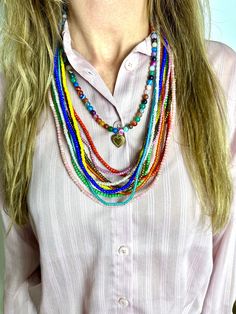 Our Layers are handmade by the women of Ghana - hand-picked by Twine & Twig. Colors of this necklace may vary. Set of 10.Please reference secondary images for the approximate length of the necklace. Twine And Twig, Horse Hair Tassels, Layered Necklace Set, Horse Hair, Collar Necklace, Bracelet Stack, Twine, Layered Necklaces, Bracelet Set