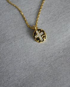 "This beautiful and dainty cross necklace would be a perfect gift for a Baptism, First Communion, Confirmation or for a godchild or godparent. The gold, silver or rose gold plated charm is approximately .25 inches and is hung on a 16\", 18\" or 20\" chain. Please add your chain length to the personalization section. If not added then we will include an 18\" chain. We also offer a 14K filled chain and a sterling silver chain in 16, 18 or 20 inches. The chains are dainty and very pretty - the perf White Cross Necklace For Baptism, Dainty Cross Necklace For Baptism, Personalized Dainty Cross Necklace, Dainty Cross Necklace For First Communion, Personalized Cross Pendant Necklace For Baptism, Dainty Cross Pendant Necklace For Baptism, Personalized Cross Necklace For Baptism, Personalized Cross Necklaces For Baptism, Personalized Baptism Cross Necklace