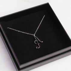 "Letter A Initial Necklace - Cursive \"A\" initial silver pendant - Personalized initial silver pendant for women / Gift for her / for mom Dainty \"A\" initial. Perfect every day necklace. Lovely gift for your self, sister, bridesmaids, new mom. Convo me if you would like to customize the length of the chain. The possibilities are endless. Pendant: Base metal is brass and 16K gold plated. Chain is 18 inches, sterling silver. (if you would like a longer or shorter chain, please contact us to cust Mother's Day Sterling Silver Initial Pendant Charm Necklace, White Gold Initial Pendant Name Necklace As Gift, Mother's Day Silver Initial Pendant Necklace, Mother's Day Sterling Silver Charm Necklaces, Silver Minimalist Initial Pendant Necklace, Minimalist Silver Initial Pendant Necklace, White Gold Initial Pendant Necklace For Gift, Silver Minimalist Personalized Initial Necklace, Silver Hypoallergenic Initial Pendant Jewelry