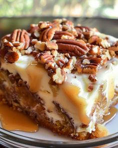 a piece of cake with pecans on top