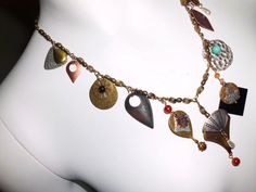 "All of these are from vintage broken or unmatched jewelry. I have cleaned it thoroughly with denatured alcohol. I think it came out well. The chain is stock I have had for a decade or so. The beads are carnelian, turquoise, faux pearls, etc. I have played with these bits and pieces for a long time making this one. :) It is about 20\" long and adjustable to 24 or 30. I will cut it to the length you want and can leave it adjustable. I am fastening it with a lobster claw closure. If you prefer a h Unique Metal Necklaces With Dangling Charms, Antique Metal Jewelry For Festivals, Nickel-free Antique Gold Metal Jewelry, Vintage Metal Jewelry For Collectors, Unique Vintage Charm Metal Necklaces, Vintage Style Metal Necklaces With Charms, Unique Adjustable Vintage Charm Jewelry, Unique Vintage Charm Adjustable Jewelry, Nickel-free Metal Jewelry With Unique Style