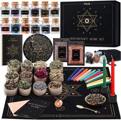 an assortment of various items including candles, incenses and other things to make a wiccah chakra set