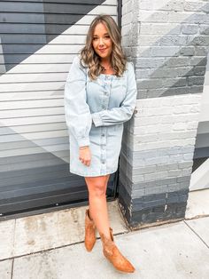 Square neck long sleeve button up denim dress with pockets.