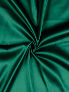 the green fabric is very soft and shiny