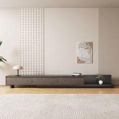 a living room with a large white rug and wooden furniture on the floor next to a plant