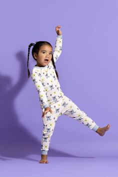 Tuck them in for a dreamy night’s sleep with our two-piece pajama set, made from 100% organic cotton that’s as soft and cozy as a hug and free from harsh chemicals. Toddlers and kids spend almost half their early years snoozing, so it’s a good feeling knowing they’re wrapped in safe, natural fabrics designed to support deep, cozy rest. This set includes a long-sleeve top and matching pants, both thoughtfully made to keep little dreamers comfortable all night long. The top features a classic crew Cartoon Print Cotton Sleepwear, Cute Relaxed Fit Bedtime Sets, Cute Bedtime Sets With Relaxed Fit, Playful Long Sleeve Sleepwear For Lounging, Playful White Loungewear Sets, Playful White Lounge Set, Cozy Cotton Bedtime Sets, Playful White Lounging Sets, Playful Cotton Sleepwear For Pajama Party