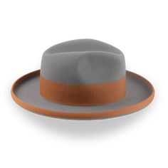 Description Materials Craftsmanship Hat Care Shipping Returns Product Description Personalize Your Wide Brim Homburg Fedora Embrace sophistication with the Solaris, a wide-brim fedora in a Homburg hat style, crafted from premium rabbit fur felt for a smooth and luxurious finish. Featuring a center-dent crown and a 3" ribbon-bound rolled brim, the Solaris offers both style and comfort. Custom-made to your exact head size, this homburg-fedora hybrid ensures a perfect fit and personalized elegance. Homburg Hat, Outdoor Hut, Gambler Hat, The Raid, Mens Hats Fashion, Fedora Hat Men, Homburg, Chapeau Cowboy, Trilby Hat