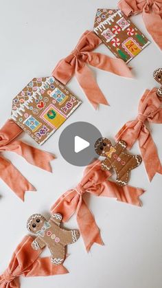 the video shows how to make gingerbread cutouts with ribbon and buttons for decoration