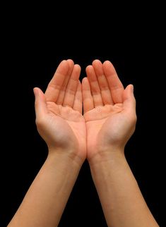 two hands folded in the air with black background royalty images and clippings on separate layers