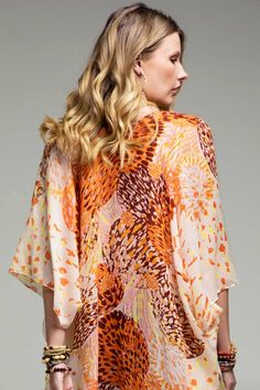 Airy vibrant dandelion print kimono with side slits, beautiful to pair with white tank and white jeans or solid tank dress! APPROX. L 73" W 36" 100% Polyester Multicolor Print Kimono For Spring Beach Cover-up, Spring Flowy Tops With Vibrant Print, Summer Kimono With Abstract Print, Summer Blouse With Graphic Print For Spring, Flowy Summer Blouse With Kimono Sleeves, Spring Bohemian Blouse With Graphic Print, Flowy Blouse With Kimono Sleeves For Summer, Graphic Print Blouse For Summer, Flowy Spring Tops With Vibrant Print