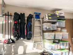 An Elfa garage system with shelves and hooks Elfa Garage, Elfa System, Wire Shelf Covers, Shelving Garage, Steel Pegboard, Garage Organization Ideas, Elfa Shelving