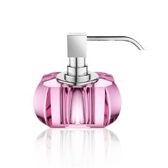 a pink glass soap dispenser on a white background