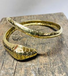 This cuff is a very detailed craftsmanship of a Python in brass. Available in brass gold color or alpaca which is brass dipped in silver. Fits around most writs and can be molded to the body. Silver Fits, Witch Jewelry, Festival Jewelry, Brass Fittings, Geometric Jewelry, Brass Gold, Brass Jewelry, Festival Fashion, Python