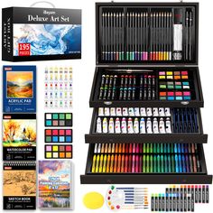 an assortment of art supplies including watercolors, markers and pencils are shown