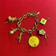 Sb3 Vintage C.1960s Monet Goldtone Bracelet Rare!! Total 6pcs Charms. Graduation Hat, Graduation Baby, Cuckoo Clock (1 Missing Part),Hula Girl (Skirt Moves), Dog W/Crown (If You Pull Tassel, Eyes & Tung Move), Birthday Charm (Changeable Date) As You See, Wear/Scratches/Discoloration Shown But Very Good Shape W/Working Safety Clasp! 7” Dont Miss This Rare & Beautiful Piece!! I Don't Polish Item & Just Send As Is. You Can Polish Whenever You Wish Price Is Firm Item Only (Unless I Mention Abt Packa Vintage Charm Bracelet For Party, Vintage Yellow Gold Bracelet With Charm, Collectible Vintage Bracelets, Vintage Collectible Bracelets, Gold Retro Bracelets With Vintage Charm, Vintage Brass Charm Bracelets, Vintage Brass Jubilee Bracelet, Vintage Gold Charm Bracelet Collectible, Vintage Formal Jewelry With Charms