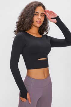 Long Sleeve High-impact Athletic Cut-out Cropped Sports Top (4 colors available) This trendy athletic top will make you look as good as you feel.Mixing a sports bra with your favorite activewear shirt.Long-sleeve with thumb holes.Breathable fabric lining with removable soft padding cups.Cutout keyhole opening under the bust.Wide waist supporting bottom hem.Soft, moisture-wicking fabric keeps you cool, comfortable & dry.From leisure errands to the gym, yoga & palates, this active top has you cove Standing Up Straight, Long Sleeve Cropped Top, Workout Crop Top, Saint John, Gym Tops, Cropped Tops, Athletic Shirts, Solid Clothes, Yoga Tops