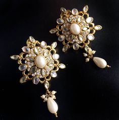 These are handmade PEARL Kashmiri Earrings Inspired by the Kashmiri culture from Northern India The drop design is inspired by their embroidery.And the Pearl flower was worn by the Native women of Kashmir.These are a modern version of their native style. These are Post earrings and are extremely lightweight. They are about 2.5 inches long Thank you for your support Go back to Storefront Taneesijewelry.etsy.com View my Entire STERLING SILVER EARRINGS Collection at https://www.etsy.com/shop/tanees Kashmiri Earrings, Kashmiri Wedding, Kashmiri Culture, Wedding Jewellery Indian, Native Women, Pearl Earrings Designs, Bridal Jewels, Jewellery Indian, Pearl Earrings Wedding