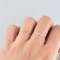 SIZING METHOD for Rings: Measure your Finger using a string or Dental Floss * With a piece of string or dental floss, wrap it snugly but not tight at the part of the finger where you want the ring will lay * Lay your measured string on the mm side of a ruler and get a mm measurement. * Look up your size on the chart below. 49 mm = size 5 51 mm = size 5.5 52 mm = size 6 53 mm = size 6.5 54 millimeters = size 7 56 millimeters = size 7.5 57millimeters = size 8 58 millimeters = size 8.5 60 millimete Adjustable Initials Stackable Rings For Everyday, Everyday Adjustable Stackable Rings With Initials, Adjustable Hypoallergenic Initial Ring For Everyday, Personalized Sterling Silver Rings For Friendship, Minimalist Stackable Rings With Heart Charm For Promise, Adjustable Simple Initial Ring For Everyday, Personalized Adjustable Stackable Rings, Dainty Adjustable Stackable Initials Rings, Dainty Heart Charm Stackable Gift Rings