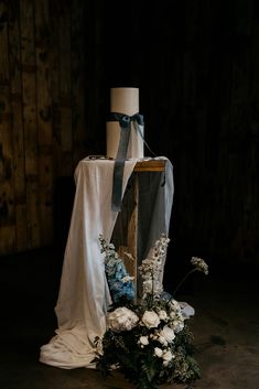 A simple, two-tier wedding cake adorned with satin bow, set against the beautiful industrial-meets-rustic barn backdrop at Hidden River Barn, Cumbria. 

Image Lauren Stacey
Cake Alison Fawkes Wedding Cake With Bow, Cake With Bow, Wedding Venue Lake, River Cabins, Barn Backdrop, Bow Cakes, River Cabin, Rustic Luxe