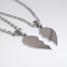 Celebrate the unique connection you share with your special someone with this set of two interlocking broken heart pieces. Perfect for Valentine's Day or any special occasion, these delicate necklaces are a symbol of the unbreakable bond you share.  ITEM DETAILS Colour: Silver (also available in Gold) Material: 304 Stainless Steel Measurement: 14-22 inches (custom) Quantity: 2 *All necklaces are made to order with extendable chain [approx 40x3mm]. Custom necklace lengths are available (max 22 inches), include this in item personalisation. ENVIRONMENT All packaging is made with recyclable and biodegradable materials.  SHIPPING Free 2nd class delivery in the United Kingdom (UK). Orders are dispatched within one working day.  RETURNS POLICY Returns and exchanges accepted within 14 days of del Couple Chains Necklaces, Gift Ideas Girlfriend, Valentines Gift Ideas, Boyfriend Necklace, Custom Chain, Delicate Necklaces, Necklace For Girlfriend, Friendship Necklaces, Couple Necklaces