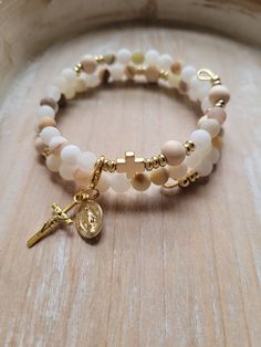 This natural stone, gold plated stainless steel modern Rosary Bracelet is inspired by a beautiful and comforting Bible passage from our Lord Jesus Christ. With the life we live today full of distractions, anxiety, and fears, we need to remember what Jesus said to us through John 14:27.  Jesus says about peace, "Peace I leave with you; my peace I give you. I do not give to you as the world gives. Do not let your hearts be troubled and do not be afraid." Stay in prayer and intercede your prayers t Christian Jewellery, Rosary Ideas, Jesus Bracelet, Frosted Flower, Flower Jade, My Peace, Christian Bracelets, Immaculate Heart, Faith Jewelry