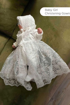 Ensure her christening day is memorable with this elegant gown. The lace detailing and flowing design create a graceful look, perfect for her blessing day. #ChristeningDress #BaptismGown #GracefulWear #BlessingDay #SpecialOccasionDress Innocent Beauty, Baby Blessing Dress, Blessing Gown, Blessing Dress, Newborn Baby Girl Outfit, Baptism Gown, Baby Blessing, First Communion Dress