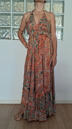 Silky, very elegant summer dress. One size, high fit. Elegant Floral Sundress, Fitted Orange Maxi Dress For Dress Down Occasions, Summer Viscose V-neck Wrap Dress, Flowy A-line Lined Midi Dress, Bohemian A-line Dress With Flowy Skirt, Summer Evening V-neck Maxi Dress, Orange Silk V-neck Dress, Flowy A-line Sundress For Dress Down Occasions, Bohemian A-line Maxi Dress For Evening