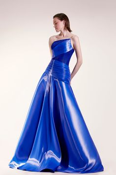 Description Blue A-line, Long dress Sleeveless Open neckline Strapless Organza Dry Clean Made in Lebanon SKU GCS 1415 Luxury Blue Gown For Spring, Luxury Designer Blue Dresses, Luxury Organza Gown With Ruched Bodice, Luxury Organza Dress With Asymmetrical Neckline, Luxury Blue Dress With Asymmetrical Neckline, Luxury Hand Embellished Blue Gown, Luxury Asymmetrical Dress With Ruched Bodice, Luxury Blue Elegant Strapless Dress, Luxury Sleeveless Organza Ball Gown