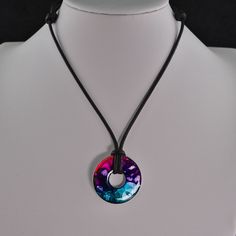 This necklace features a unique one-of-a-kind alcohol ink painting forever preserved in resin making it a perfect fit for those with a unique style. The pendant itself is painted on a stainless steel washer and carries with that a nice weight that makes the overall necklace very substantial. Due to the transparency of alcohol ink and the metallic properties of the steel, the painting in the washer shifts with the light and is very vibrant depending on how the light hits it. Dimensions: Necklace Adjustable Resin Round Pendant Necklace, Resin Making, Alcohol Ink Painting, Acrylic Jewellery, Silk Cord, Alcohol Inks, Ink Painting, Scenery Wallpaper, Alcohol Ink