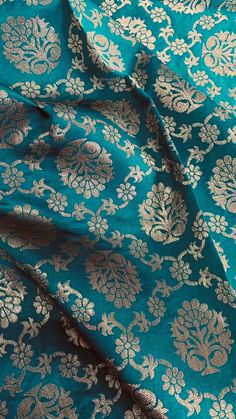 This is Brocade Jacquard fabric is very soft and skin-friendly. It is extensively used in making stoles, scarves, dress materials, curtains, cushion covers and many clothing products. The fabric is woven on loom made with goldarn thread with black yarn. Pot motifs with flowers figures appear in brocade shapes, popularly called as 'buti'. Fabric - art silk ( viscose by silk ) Fabric has Weave (texture) like a Dupion Silk. width - 45 inch quantity -1 yard Color & print - Sea Green with matt go Yarn Pot, Banarasi Brocade Fabric, Fabric Wedding Dress, Banarasi Brocade, Wedding Dress Fabric, Screen Printed Fabric, Wedding Dress Fabrics, Dupion Silk, Etsy Wedding Dress