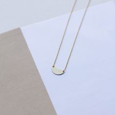 "HALF MOON NECKLACE A dainty gold chain necklace with a small half circle pendant in 9K or 14K solid gold. Minimalist design, delicate necklace ideal for everyday wearing, layered with other necklaces. This semicircle necklace is a great choice for a Mothers Day gift for mom. F E A T U R E S * Metal: High-quality Solid Gold 9K or 14K * Color: Yellow Gold, White Gold, Rose Gold * Dimensions: 15 x 7mm * Length: 16\" to 19.5\" (40cm to 50) Solid Gold jewelry is the best choice if you want your jewe Minimalist Jewelry With Adjustable Half Moon Chain, Minimalist Crescent Necklaces For Everyday, Everyday Minimalist Crescent Necklaces, Minimalist 14k Gold Filled Round Necklace, Elegant Everyday Half Moon Necklace, Minimalist Moon Shaped Jewelry In 14k Gold, Minimalist Moon Shaped 14k Gold Jewelry, Minimalist 14k Gold Moon Jewelry, Dainty Yellow Gold Half Moon Necklace