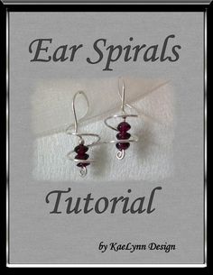 the book cover for ear spirals is shown with red beads and silver wire on it