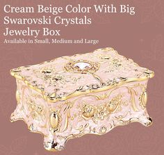 an ornate box is shown with the words cream begge color with big swaroski crystals jewelry box available in small, medium and large sizes