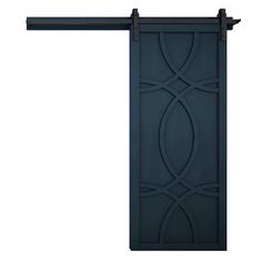 a black door with an iron design on the top and bottom panel, against a white background