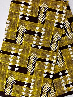 "Material: 100% cotton TOP QUALITY FABRIC Print: DOUBLE-sided  Width: 45\" This timeless appeal & adorable African print is perfect for making African Clothing, African Quilts, Upholstery, Home Décor, and unique accessories. FABRIC CUT:        Purchase of 1+ yards per customer will be cut as 1 continuous  piece of fabric up to a maximum length of 6 yard. LABELS: All African fabric is sold with an adhesive Manufacturer label attached. Create your unique one of a kind piece. Get it today.  Each pi Summer Green Cotton Patterns, Printed Yellow Ankara Fabric, Yellow Printed Ankara Fabric, Printed Cotton Fabric For Summer, Summer Cotton Fabric With Pattern Prints, Yellow Cotton Fabric With Geometric Pattern, White Cotton Fabric For Summer, Yellow Geometric Pattern Cotton Fabric, White Cotton Summer Fabric