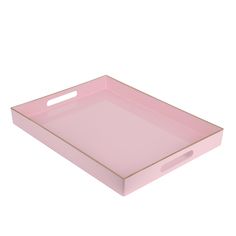 a pink rectangular tray with gold trim